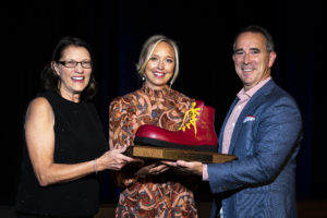 Red Shoe award winners. L-R Susan Adams, CEO, Stacy and Dave Lopez 