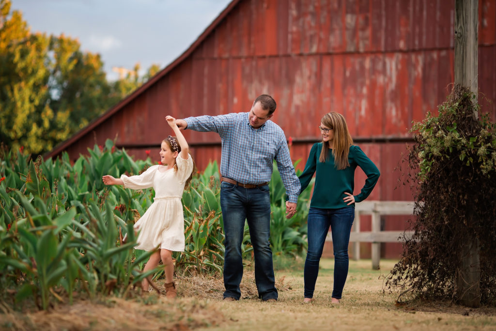 Playful poses help keep everyone engaged during family photos. 