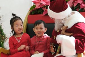 Kids hanging out with Santa at Myriad Gardens, a Downtown in December destination. 