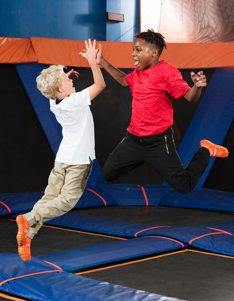 Boys jumping at Sky Zone Trampoline Park