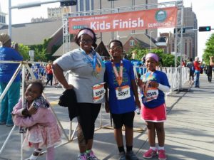 The author and her kids after running in the Oklahoma City Memorial marathon kid run.