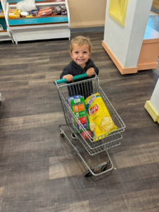 Kids can work and shop at a kid-size grocery store inside the Jasmine Moran Children's Museum. 