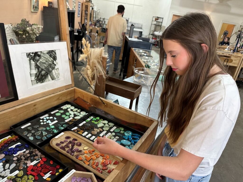 YOUNG MAKERS customize and create their own jewelry in the CLASSES AT CHEYENNE SKY STUDIO.